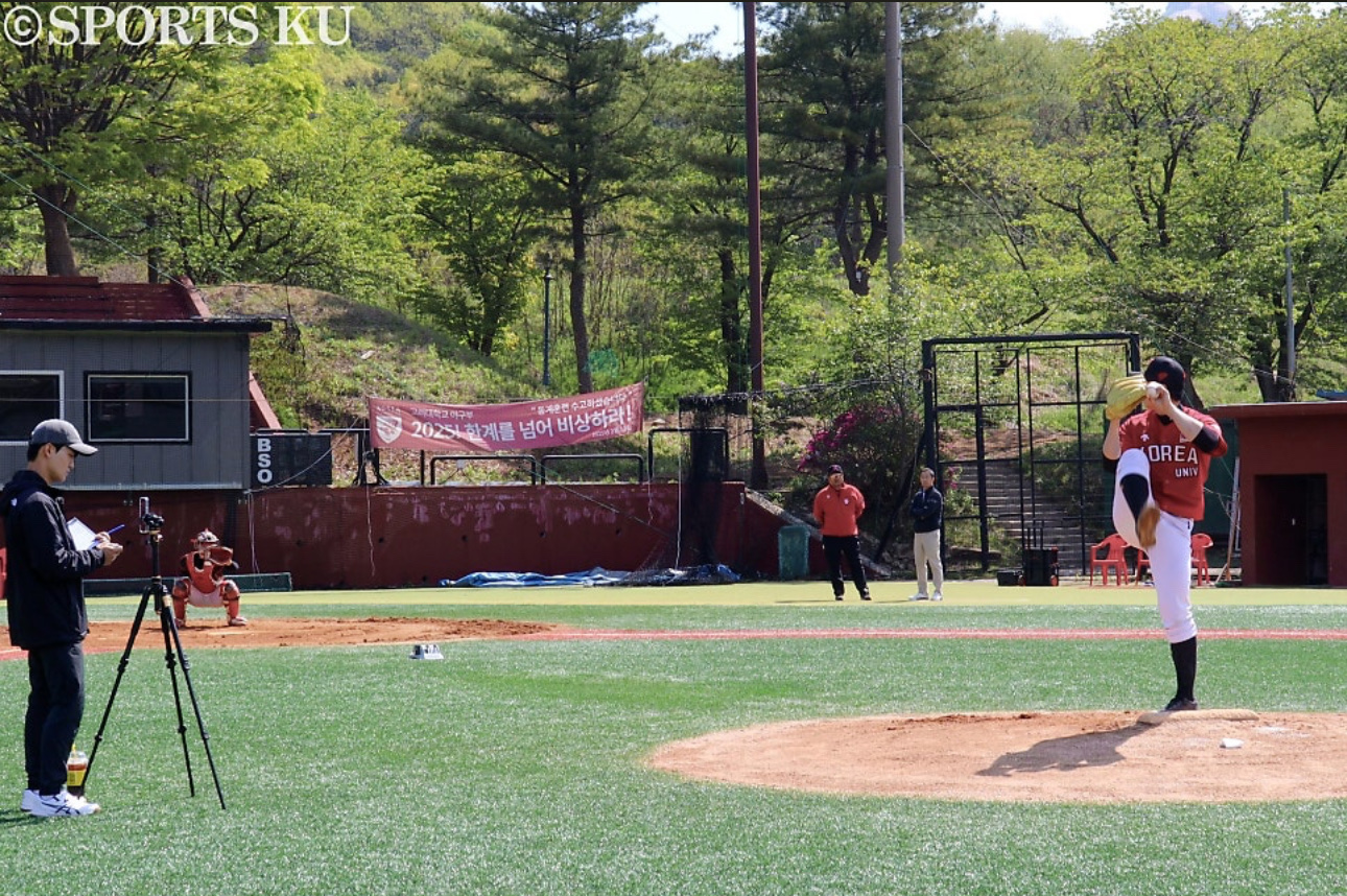 BBL analyst capturing a Korea University pitcher on the field